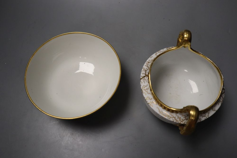 A Flight Barr and Barr seaweed gilt two handled sucrier and a Flight Barr Worcester bowl gilt with leaves and flowers and the initials